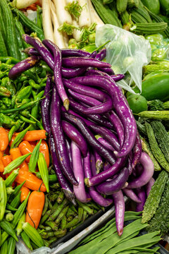 Sicilian long purple eggplants vegetables for sale at Itallian market