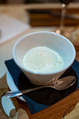Bowl with grated parmesan Parmigiano-Reggiano hard cheese in Parma, Emilia Romagna, Italy