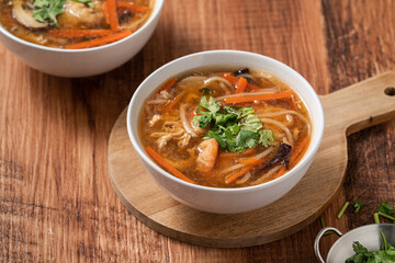 Delicious traditional thick soup with shrimp meat ball and vegetables.