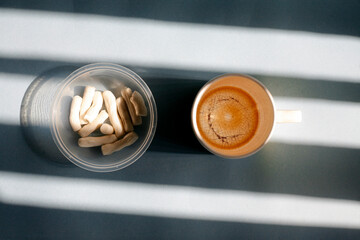 bowl of salty snack with empty cup of coffee