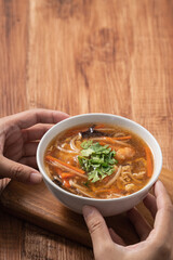 Delicious traditional thick soup with shrimp meat ball and vegetables.