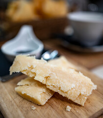 Tasting of different matured and old parmesan Parmigiano-Reggiano hard cheese in Parma, Emilia Romagna, Italy