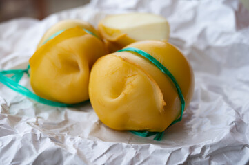 Italian cheeses collection, smoked scamorza pear shaped cheese from small cheese farm in South Italy
