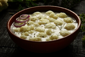Homemade organic cauliflower vegetable cream soup.