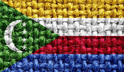 Comoros flag on fabric texture. 3D image