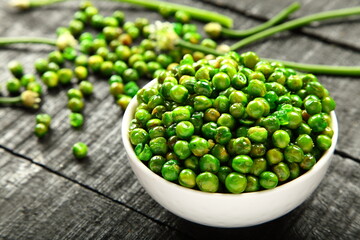Bowl of  delicious vegan diet snack food- roasted green peas. 