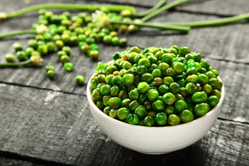 Bowl of  delicious vegan diet snack food- roasted green peas. 