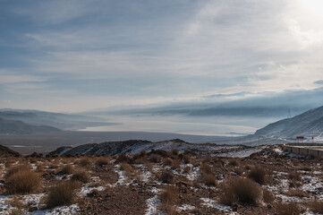 view of the valley and mountain lake