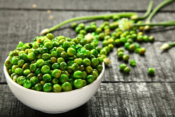 Roasted green peas. beans, healthy vegan diet snack foods.