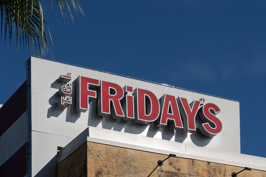 Orlando, Fl, USA - January 6, 2022: Close up of TGI Fridays restaurant sign on the building in Orlando, Fl, USA. TGI Fridays is an American restaurant chain