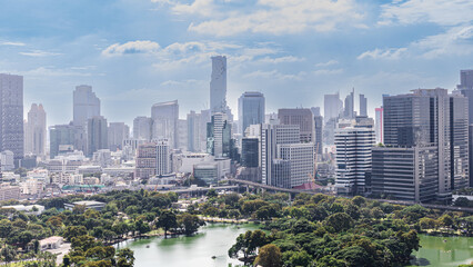 Fototapeta premium Wonderful cityscape at Lumphini Park, Park is a park in Bangkok, Thailand.