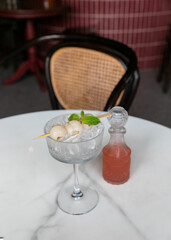 Fresh juicy lychee fruit on a glass plate. Peeled lychee fruit.