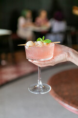 Fresh juicy lychee fruit on a glass plate. Peeled lychee fruit.