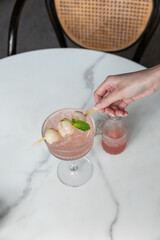 Fresh juicy lychee fruit on a glass plate. Peeled lychee fruit.