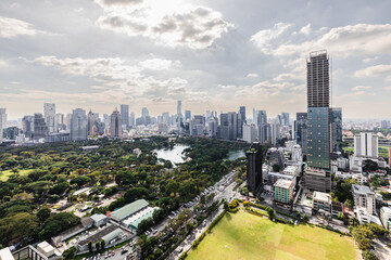 Fototapeta premium Wonderful cityscape at Lumphini Park, Park is a park in Bangkok, Thailand.