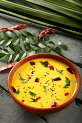 Moru kachiyathu, Kachu moru, spiced buttermilk curry. Kerala recipes background.