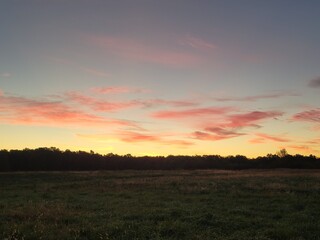 Obraz premium sunset over the field