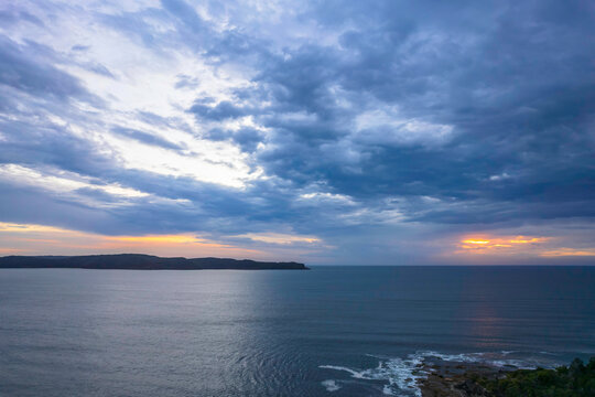 Cloudy sunrise seascape as a storm moves on