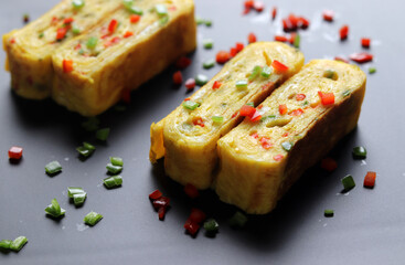 Egg roll made with paprika and bell peppers. 

