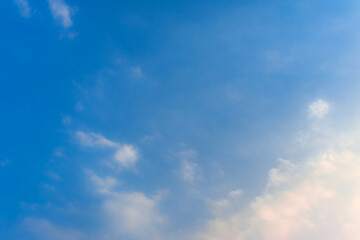 Fototapeta premium Bright blue sky with white fluffy clouds
