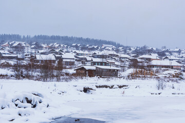 Fototapeta na wymiar View of Russian village in winter
