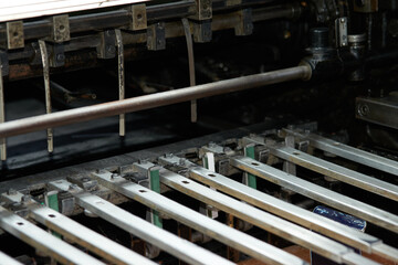 Close up industrial print offset machine mechanics 