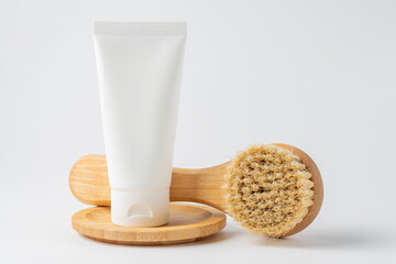 Set of home SPA cosmetic products. Dry Brush, Organic cream with essential Oil. Anti-cellulite brush for dry body massage. Women's organic scin care. Prevent cellulite and body problem at home