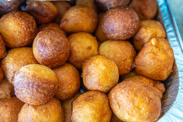Pile of Nigerian Puff Puff served at party