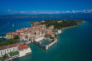 Aerial photography with drone. Aerial view on Sirmione sul Garda. Italy, Lombardy.  Rocca Scaligera Castle in Sirmione.