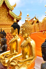 Buddha statue around the Golden pagoda Wat PhraThat Doi SuThep Chiang Mai province, Thailand.