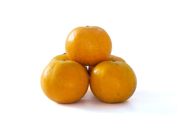 Pile of Tangerine or Orange fruit isolated on white background included clipping path.