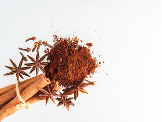 Star anise and cinnamon stick isolated on white background, top view