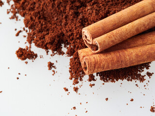 Star anise and cinnamon stick isolated on white background, top view