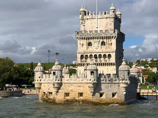 A heavy stone castle as seen from the sea