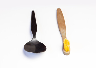 Concept of dental hygiene. Spoon and tooth brush .