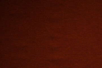 Seamless dark red fabric texture background of woven cloth