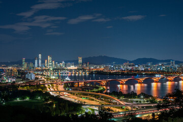 Seoul city skyline, National Assembly building, Hangang River at night, South Korea. 서울, 여의도, 성산대교, 한강, 저녁, 일몰, 강변북로