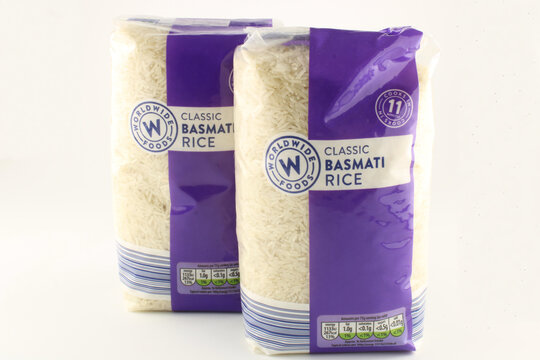 Basmati rice. Two packets of classic Basmati rice isolated on white with copy space.  Lancashire, UK, 05-03-2021