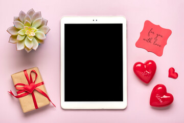 digital tablet for chooses gifts, makes purchase, envelope, red hearts on pink table Top view Flat lay Holiday shopping list, Happy Valentine's day, party, online shop concept Mock up