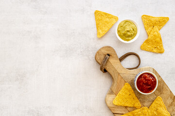 Snack for party corn nachos with salsa and guacamole sauces