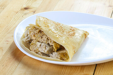 Pancake with chicken and onion