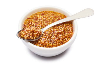 Classic Dijon mustard sauce in ceramic bowl isolated on white background