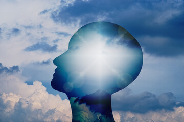 Inspiration and hopeful vision. Human head silhouette and cloud.