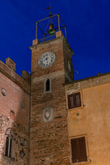 Fototapeta na wymiar The ancient Civic Tower of Lajatico, Pisa, Italy, at dusk