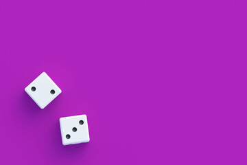 Leisure entertainment for the whole family. Board games. Addiction to gambling. Casino games. Random winnings. Jackpot. Two dices on violet background. Top view. Copy space. 3d render