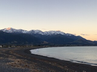 Snowy mountains coast line