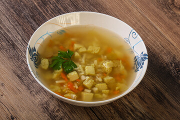 Tasty chicken soup with carrot