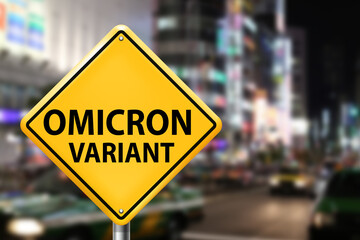 Covid 19 Omicron Variant at warning sign in street