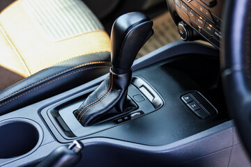 automatic transmission shift selector in the car interior. Closeup a manual shift of modern car...