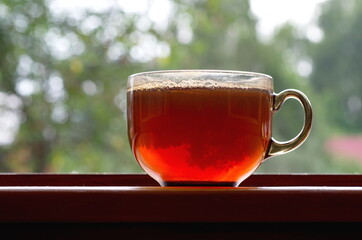 A mug of tea on the windowsill